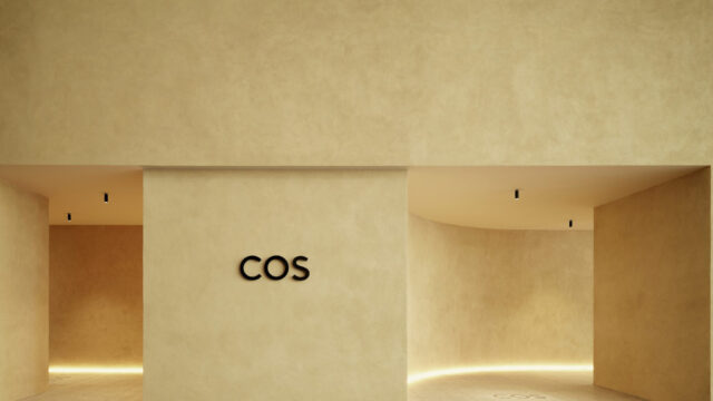 Seamless interior wall finished with Clayworks natural clay plaster, an unfired, highly breathable, and zero-VOC architectural surface. cos building enterance