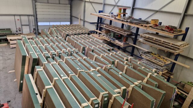 Dun Agro prefabricated timber-framed hempcrete wall panel, serving as a monolithic, carbon-negative building envelope.