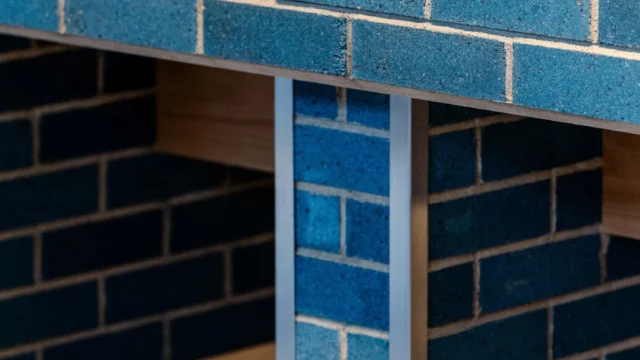 Exterior masonry facade built with Kenoteq K-Briq, an unfired brick made from 90 percent recycled construction waste.