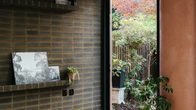 Exterior masonry facade built with Kenoteq K-Briq, an unfired brick made from 90 percent recycled construction waste.