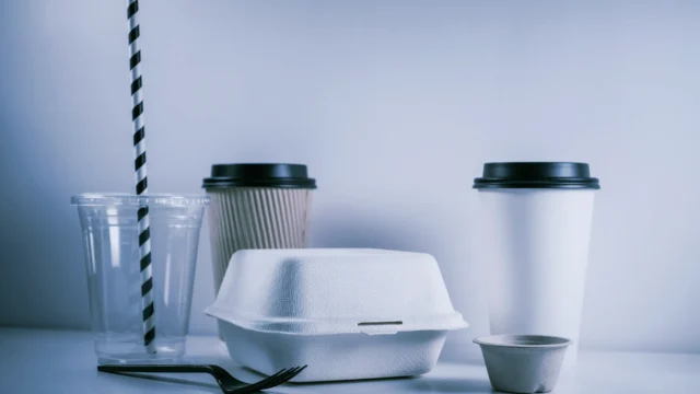 Paper food packaging coated with Solon PHA by RWDC Industries, providing a waterproof and oil-resistant barrier that is naturally marine biodegradable.