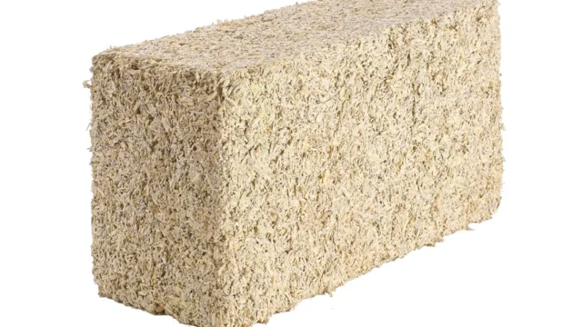 Biomattone® pre-cast hempcrete blocks stacked on a construction site, ready for dry assembly as a biogenic infill wall.