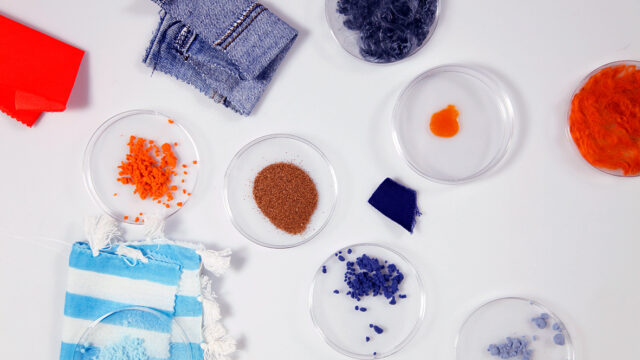 High-tenacity Ioncell textile fibers spun from dissolved post-consumer cellulosic waste using a non-toxic ionic liquid process.