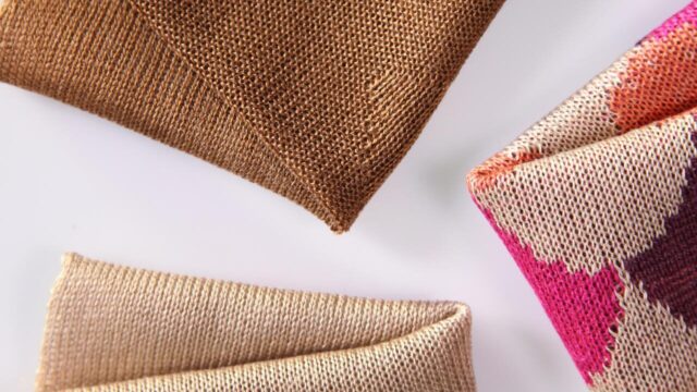 Regenerating fashion: Ioncell transforms old cotton textiles, cardboard, and wood pulp into premium virgin-quality fibers without the toxic Carbon Disulfide (CS2) used in traditional Viscose production.