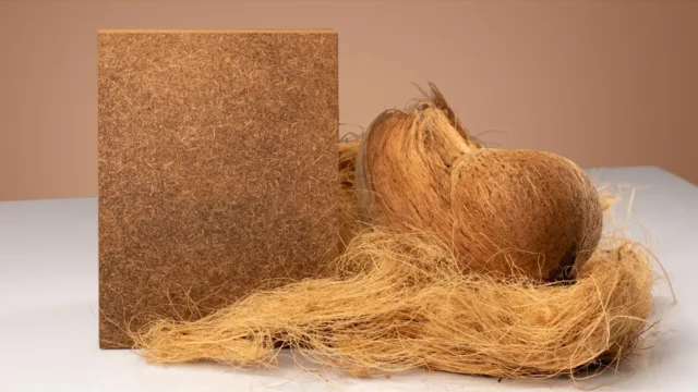 Rigid Cocoboard® bio-composite panels manufactured by Naturloop using upcycled coconut husks and a formaldehyde-free bio-binder.
