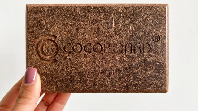 Rigid Cocoboard® bio-composite panels manufactured by Naturloop using upcycled coconut husks and a formaldehyde-free bio-binder.